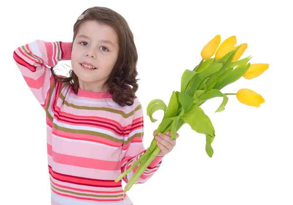 Charming schoolgirl pereds bouquet of yellow flowers. — Stock Photo, Image