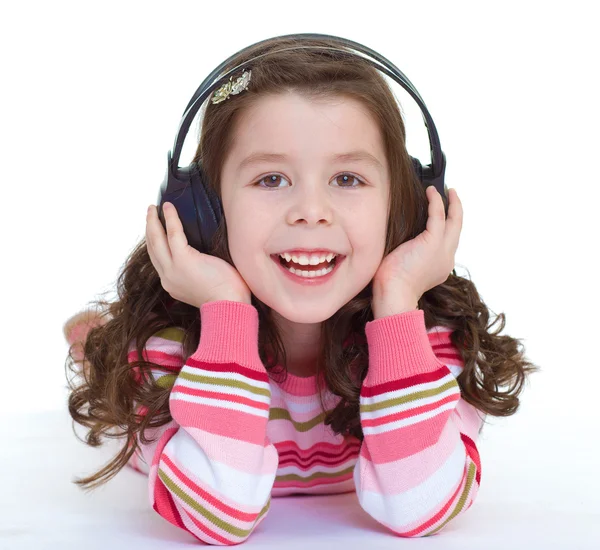 Charming and very musical little girl dancing. — Stock Photo, Image