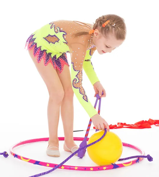 Little girl exercising with gymnastic mace — Stock Photo, Image