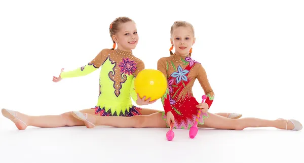 Two pretty little girl doing gymnastics — Stock Photo, Image