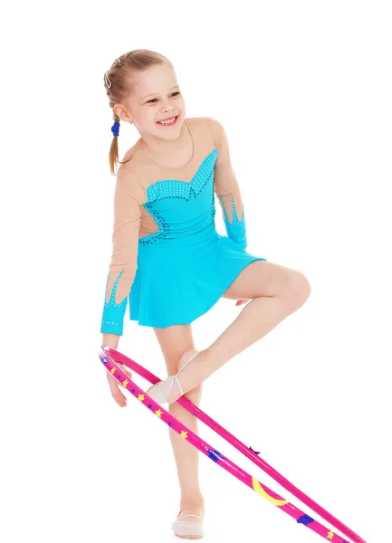 Beautiful little gymnast with the hoop — Stock Photo, Image