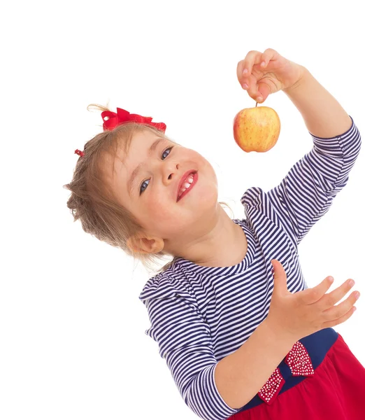 Little girl with apple. — Stock Photo, Image