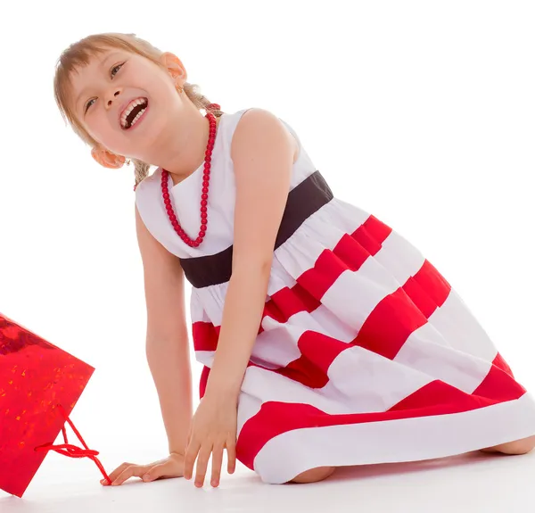 Young girl with the package. — Stock Photo, Image