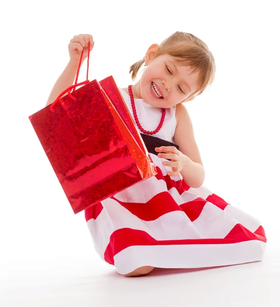 Young girl with the package. — Stock Photo, Image