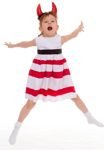 A young girl wearing the head horns. — Stock Photo, Image