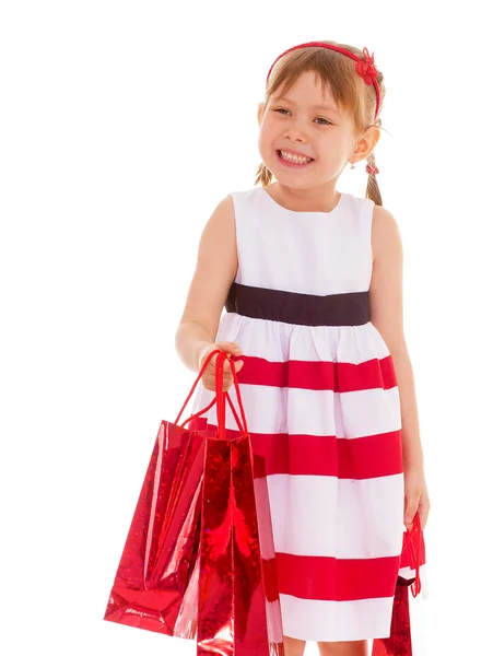 Küçük kız alışveriş gidiyor. — Stok fotoğraf