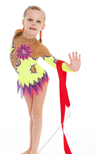 Adorable little gymnast dancing with ribbon — Stock Photo, Image