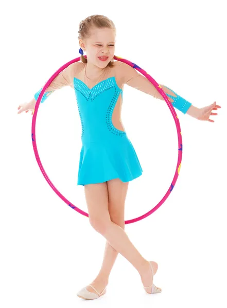 Beautiful little gymnast with the hoop — Stock Photo, Image