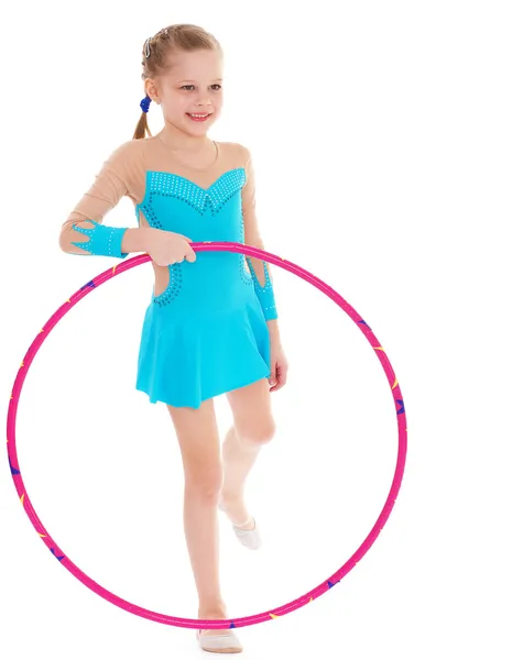 Beautiful little gymnast with the hoop — Stock Photo, Image