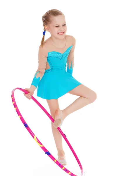 Beautiful little gymnast with the hoop — Stock Photo, Image