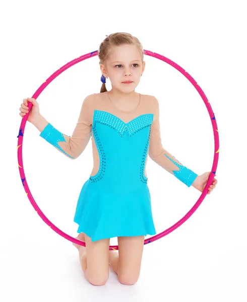 Beautiful little gymnast with the hoop — Stock Photo, Image