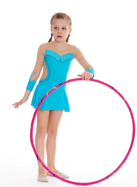 Beautiful little gymnast with the hoop — Stock Photo, Image