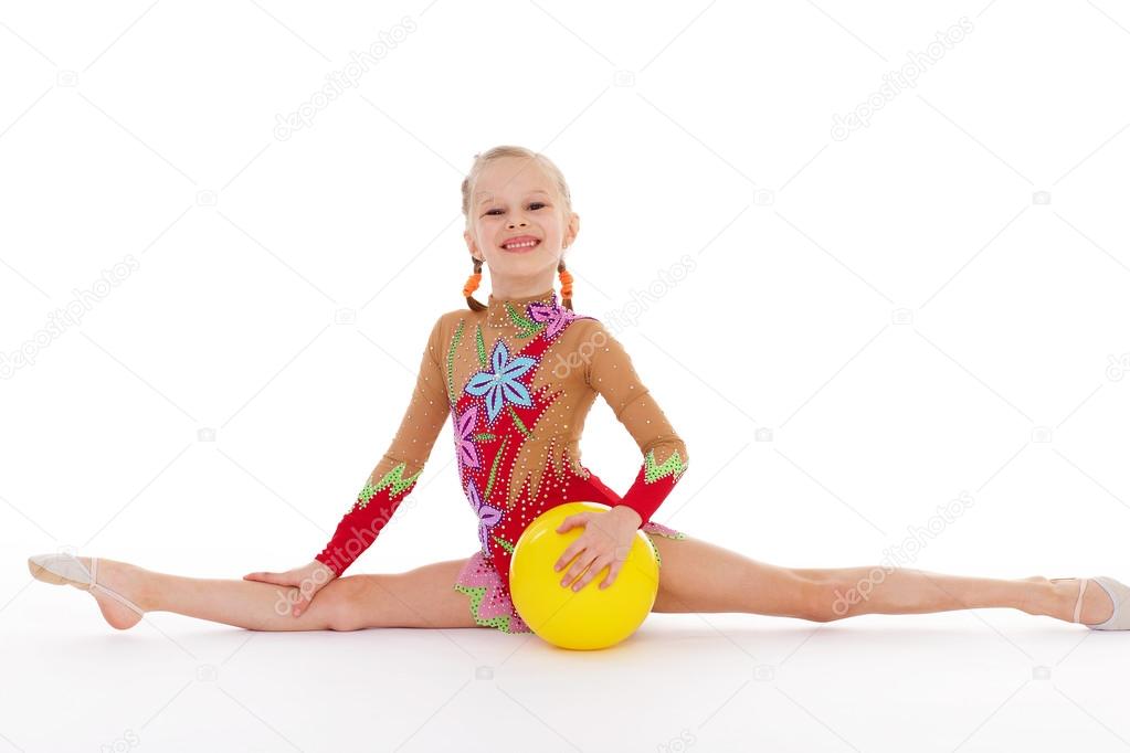 girl holding ball.