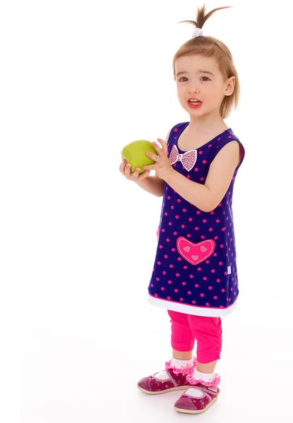 Little girl with apple. — Stock Photo, Image