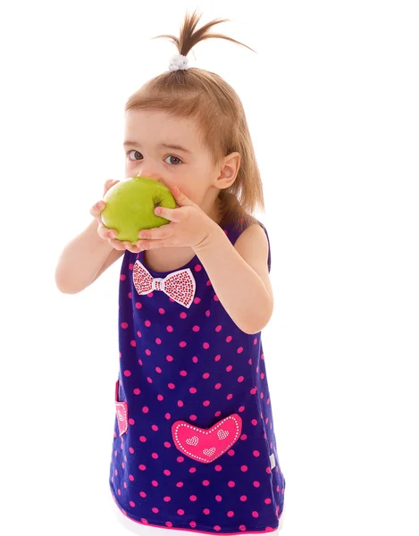 Little girl with apple. — Stock Photo, Image