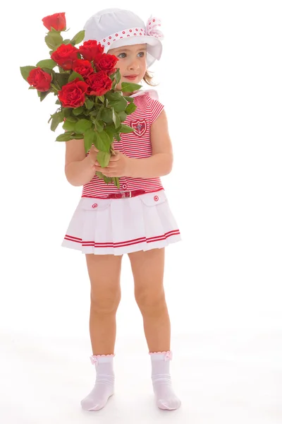 Menina encantadora com uma rosa na mão . — Fotografia de Stock