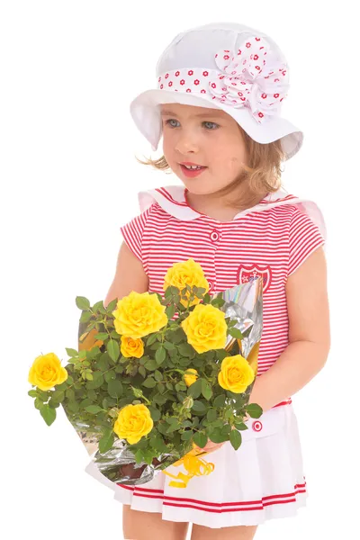 Charmante petite fille avec un bouquet . — Photo