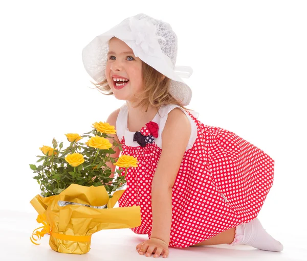 Pembe elbiseli neşeli küçük kız. — Stok fotoğraf
