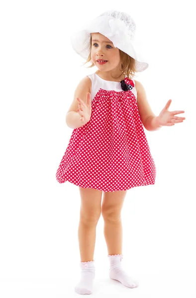 Fashionable little girl in a pink dress. — Stock Photo, Image