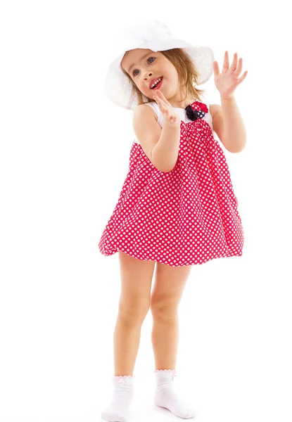 Fashionable little girl in a pink dress. — Stock Photo, Image