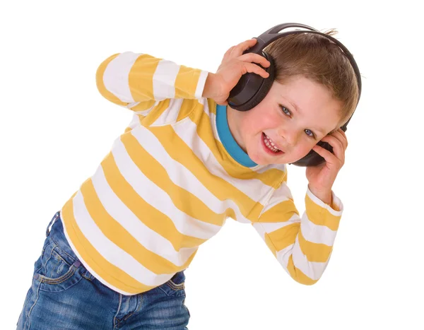 Niño pequeño con auriculares — Foto de Stock