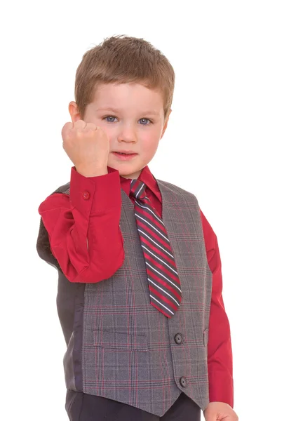 Little boy shakes his fist. — Stock Photo, Image