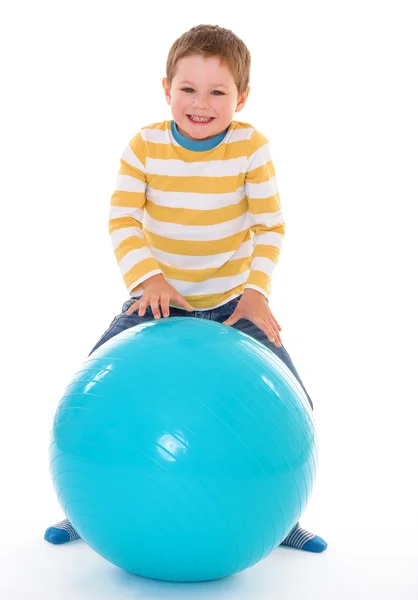 Little boy with a big ball. Stock Image