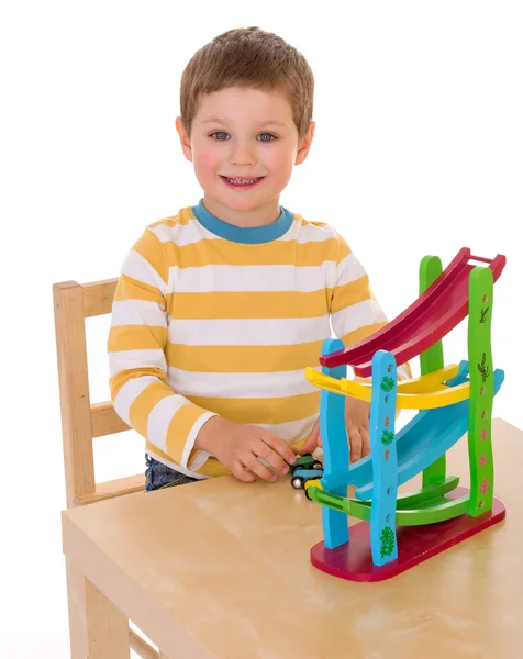 Little boy playing at the table — Stock Photo, Image