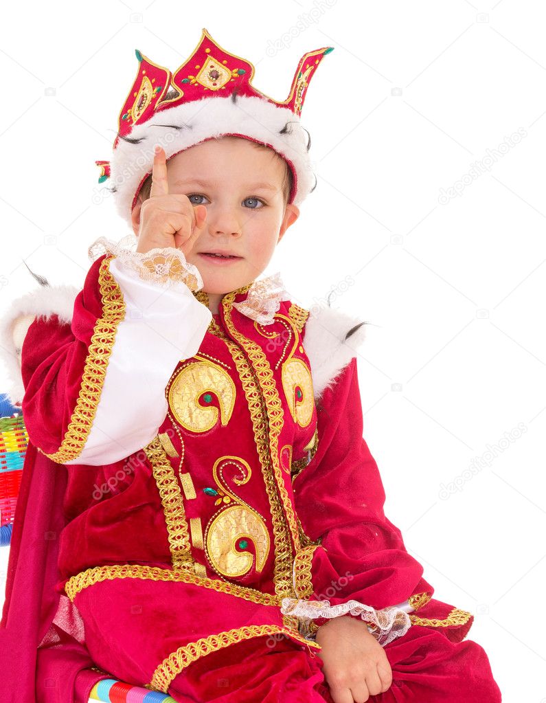 little boy dressed as a king.