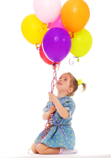 Charmante meisje met ballonnen. — Stockfoto