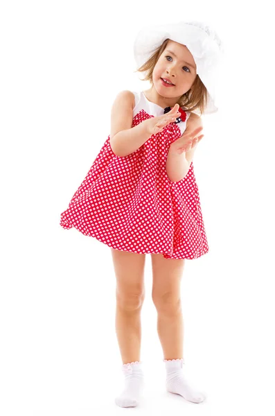 Fashionable little girl in a pink dress. — Stock Photo, Image