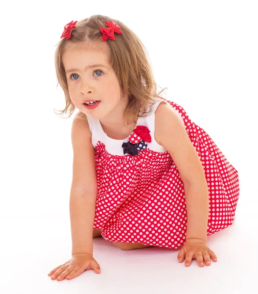 Pembe elbiseli neşeli küçük kız. — Stok fotoğraf