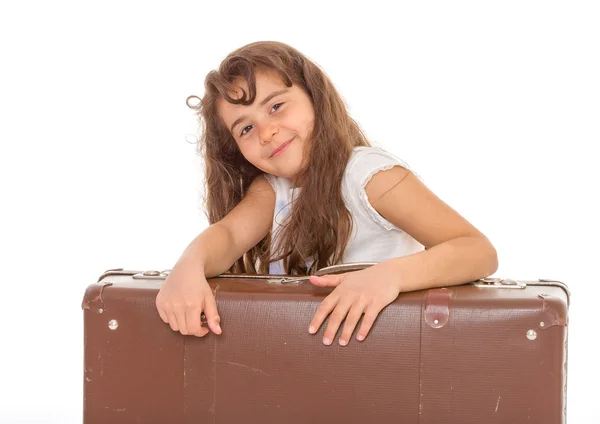 Mała dziewczynka z walizką — Zdjęcie stockowe