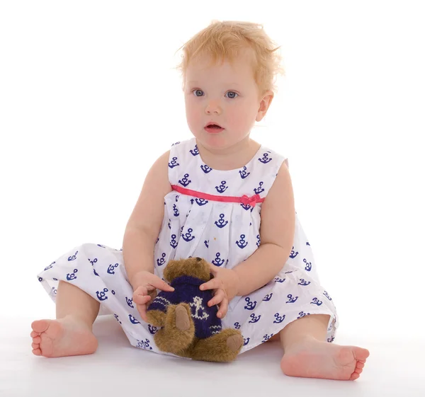 Charming little girl with teddy bear — Stock Photo, Image