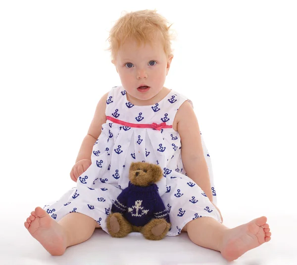 Charming little girl with teddy bear — Stock Photo, Image