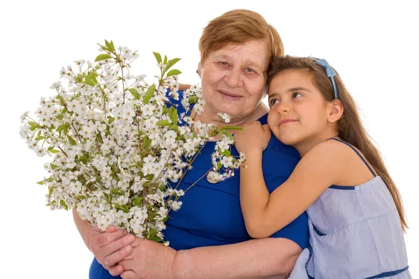 Babcia i wnuczka z bukietem — Zdjęcie stockowe