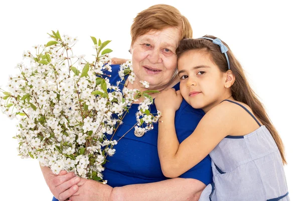 Avó e neta com um buquê — Fotografia de Stock