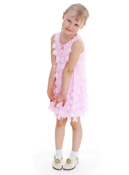 Menina jovem em um vestido rosa . Imagens Royalty-Free