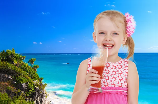 Girl on a background of blue sea — Stock Photo, Image