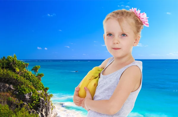Little girl near the ocean Royalty Free Stock Photos