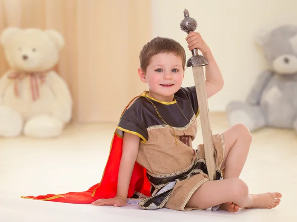 Little boy with a sword — Stock Photo, Image