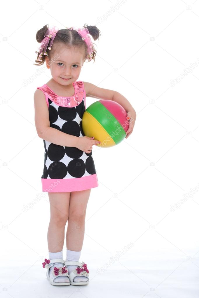 Little girl with a ball.