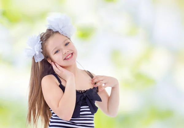 Young girl c white bows — Stock Photo, Image