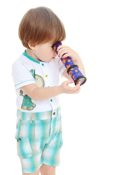 Little boy with a telescope. — Stock Photo, Image