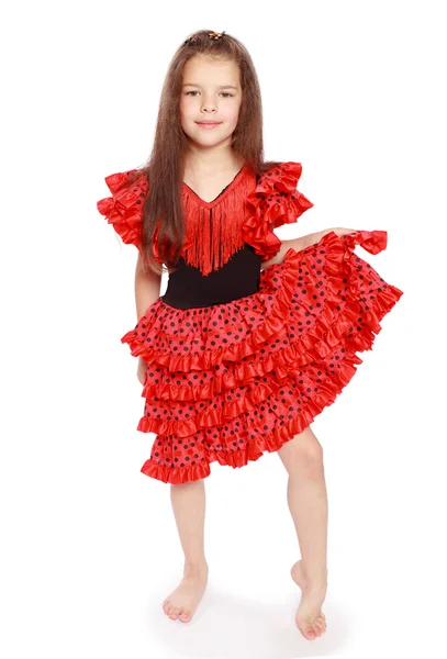 Girl in a bright red dress. — Stock Photo, Image
