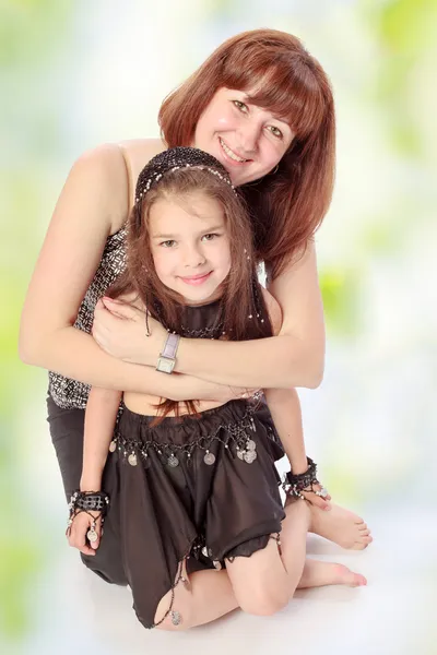 Mother and daughter hugging. — Stock Photo, Image