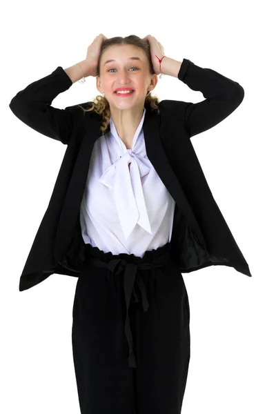 Glad förvånad student flicka i formell svart kostym — Stockfoto