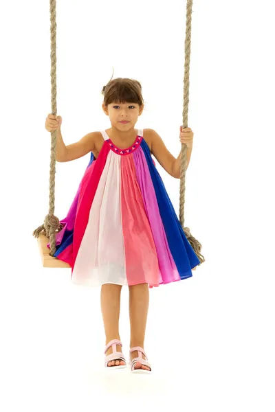 Full length shot of cute girl on swing — Stock Photo, Image