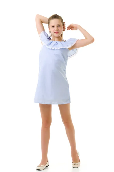 Guapa chica luz vestido posando en estudio contra blanco Backgr —  Fotos de Stock