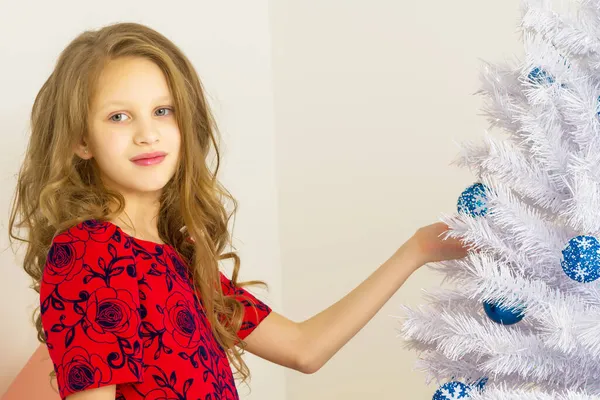 Girl Standing Next Decorated Christmas Tree Holding White Branch — Stock Photo, Image